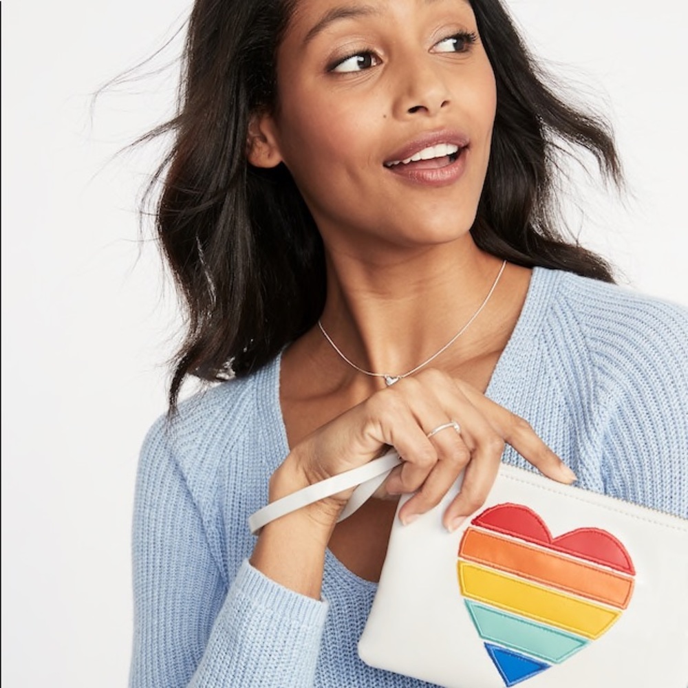 Faux-Leather Wristlet with Rainbow Heart Graphic.